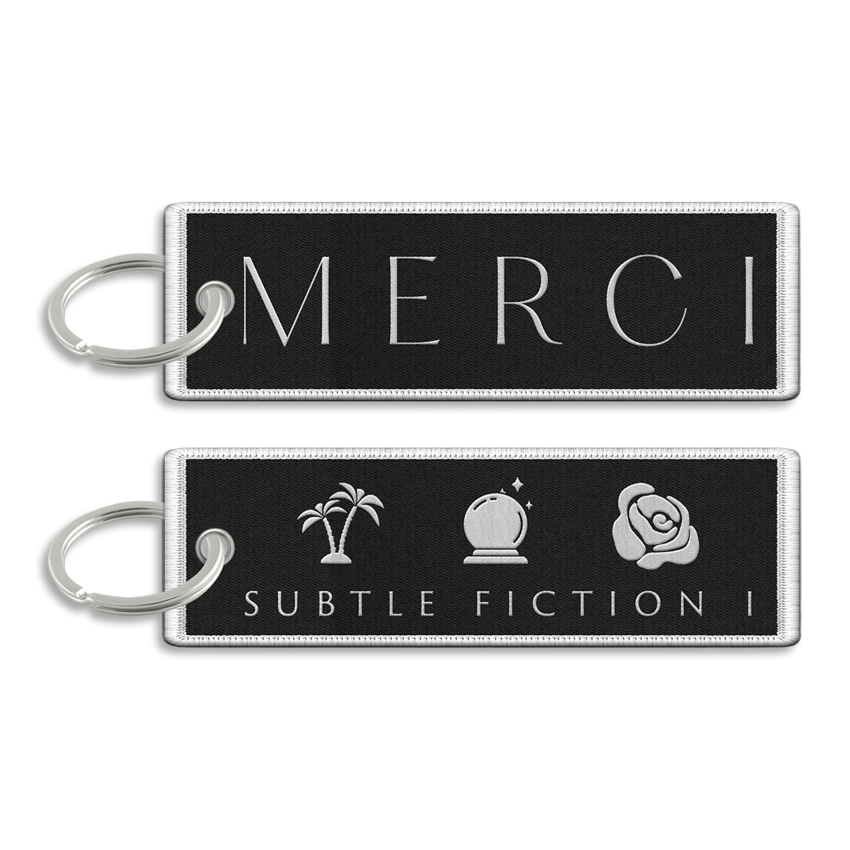 Merci - Subtle Fiction I Embroidered Keychain