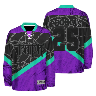 a purple and black jersey with a black and green design