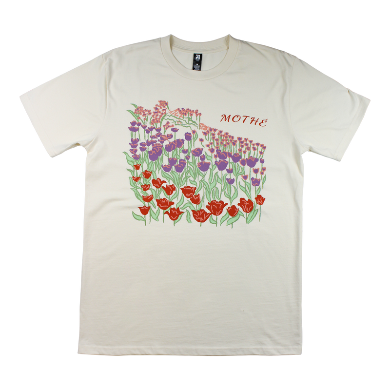 a white shirt with flowers on it