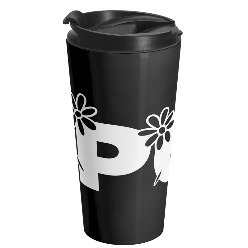 a black coffee cup with white letters and flowers on it