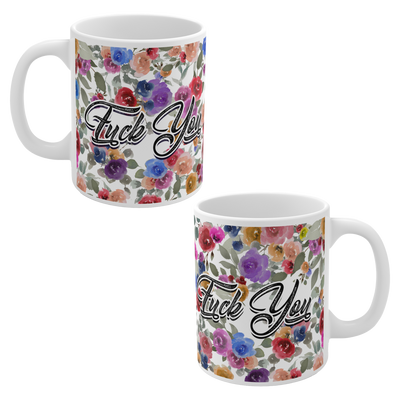 a couple of mugs with flowers
