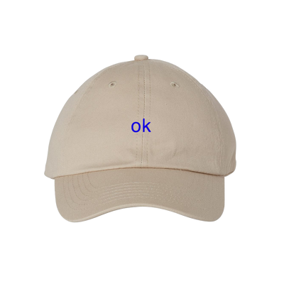 a tan hat with blue text on it