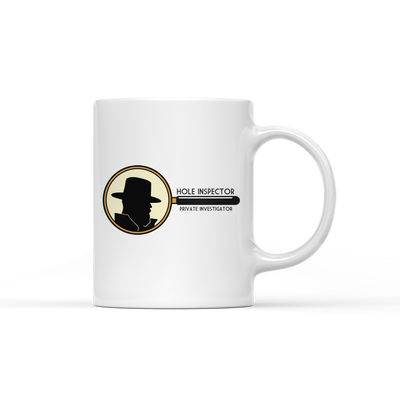 a white mug with a logo and a sticker on it